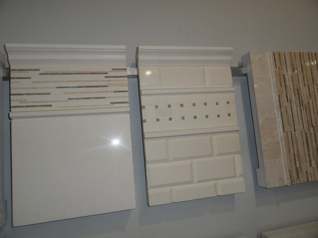 White ceramic and marble tile sample boards with mosaic accents
