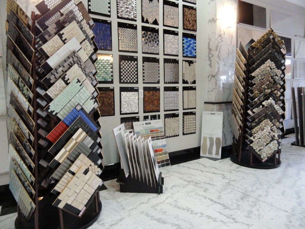 Natural stone tile samples on showroom table